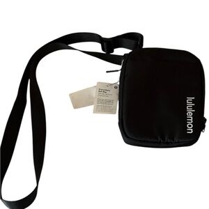 Lululemon crossbody, black with adjustable straps, NWT, 7”x6”